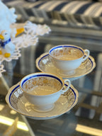 Porcelianinis puodelis su lėkštute