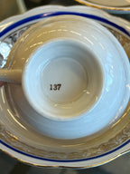 Porcelianinis puodelis su lėkštute