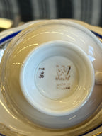 Porcelianinis puodelis su lėkštute