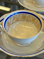 Porcelianinis puodelis su lėkštute